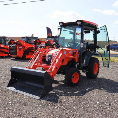 Aged KIOTI CX2510HCB Tractor with Cab and Loader